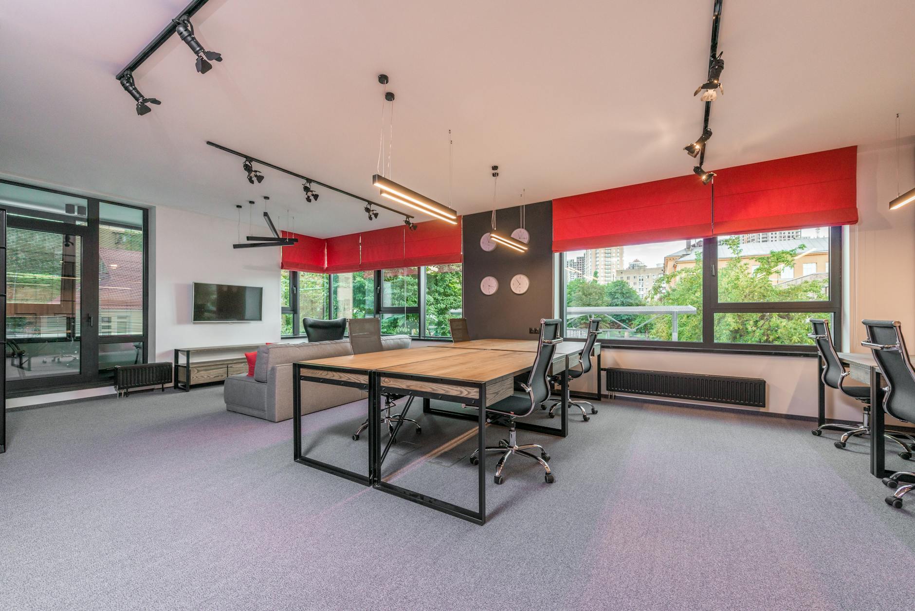 Contemporary office workspace with modern desks ergonomic chairs and professional lighting design