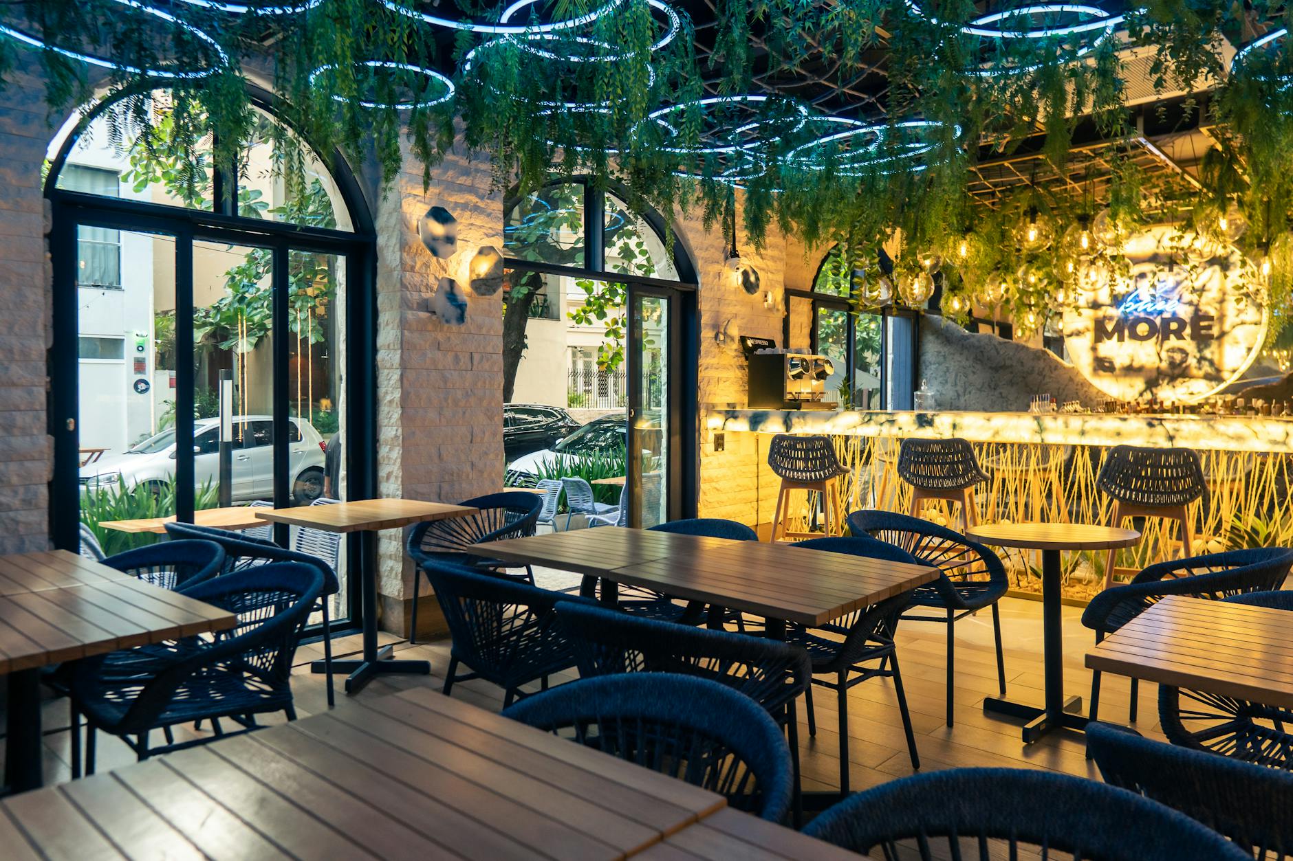 Modern restaurant interior design with elegant dining tables atmospheric lighting and stylish decor